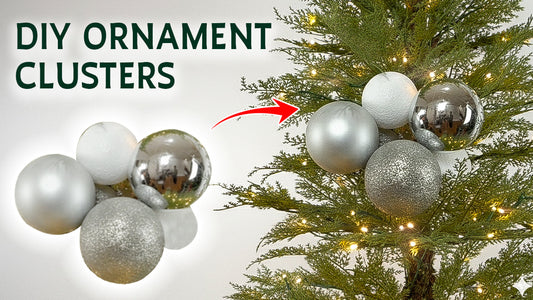 A tutorial thumbnail showing how to make DIY ornament clusters using silver baubles on a skinny Christmas tree.