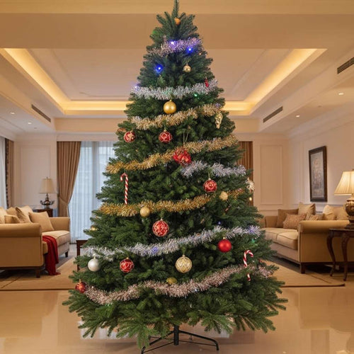 A classic artificial Christmas tree decorated with silver and gold tinsel in a formal living room.