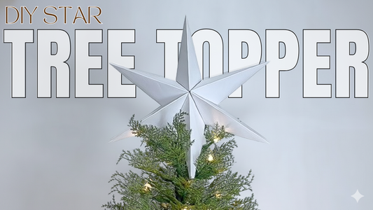 Title graphic for "DIY Star Tree Topper" featuring a white 3D paper star on a Christmas tree.