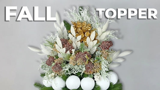 Title graphic for "Fall Topper" showing a Christmas tree with a fall-themed floral and pinecone arrangement.