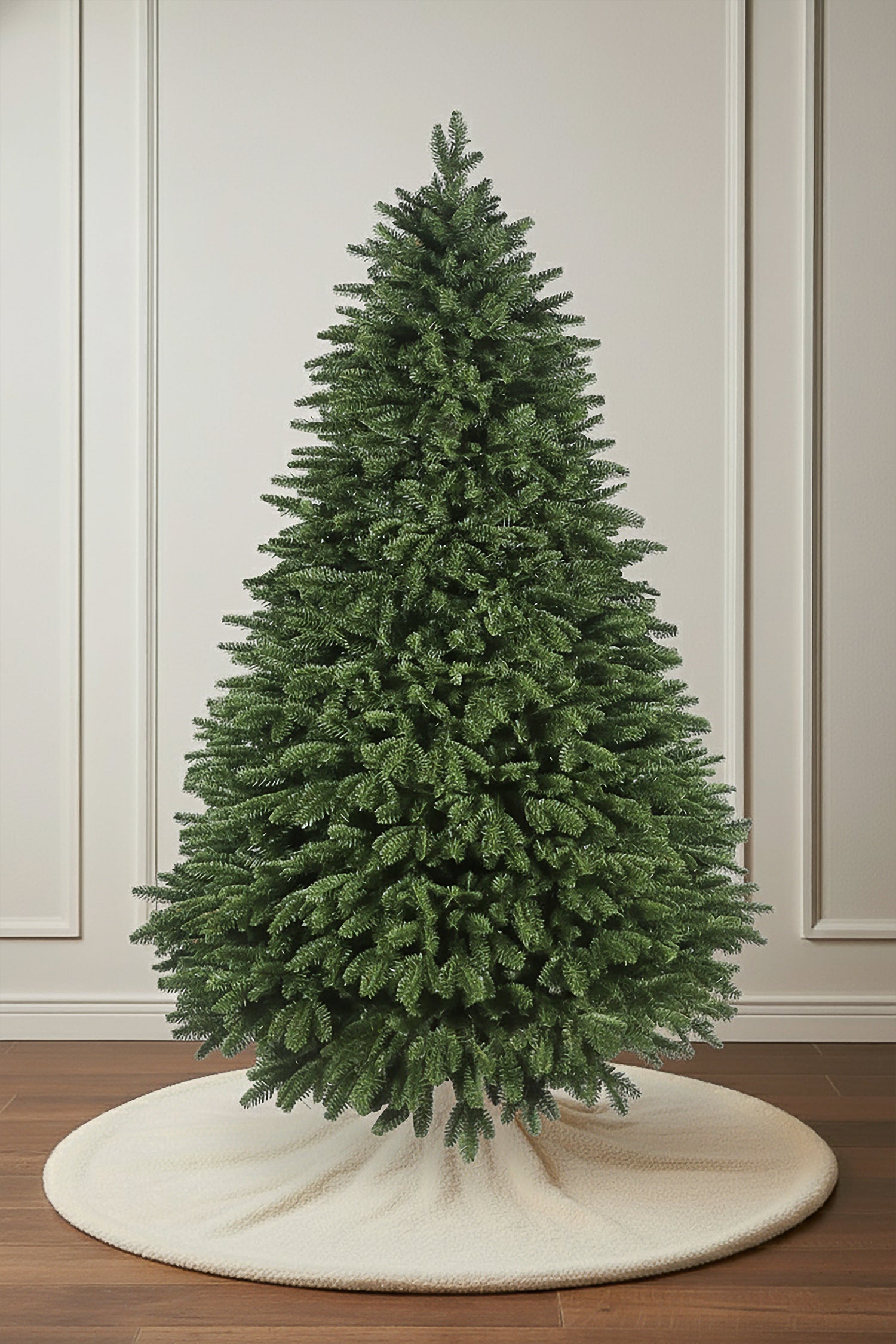 An unlit Traditional Fraser Fir tree from Hearth & Fir, showcasing its classic shape and full branches.