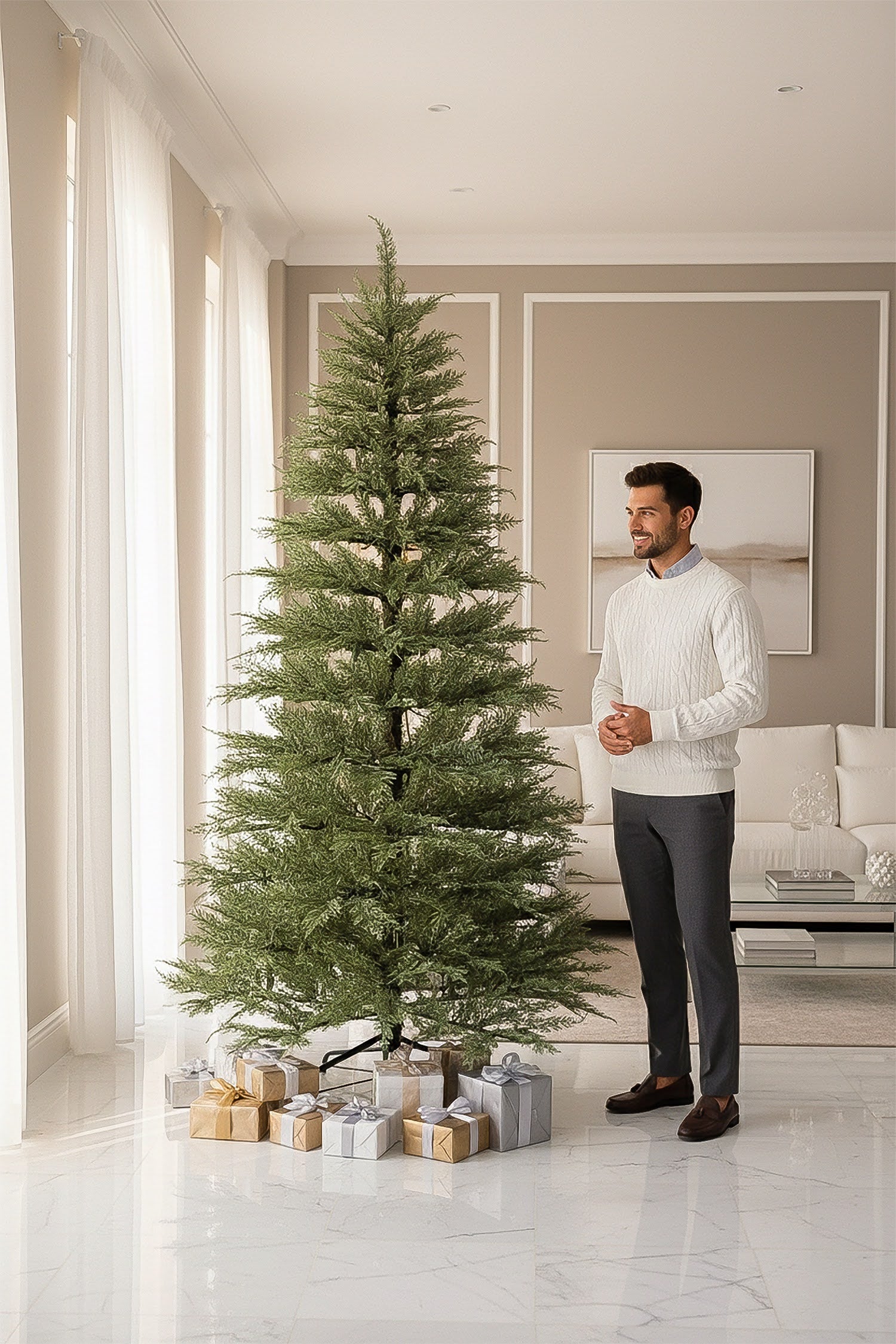 A tall, unlit 9-foot minimalist Christmas tree standing in a bright, modern living room with marble floors.