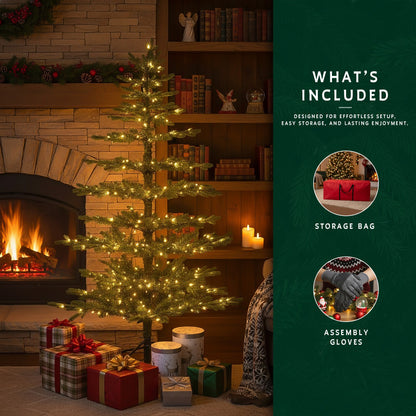 The pre-lit 9ft skinny Christmas tree with its included storage bag and assembly gloves displayed.