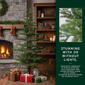 An unlit 9ft skinny Christmas tree by a fireplace, with an insert showing a close-up of the needles.