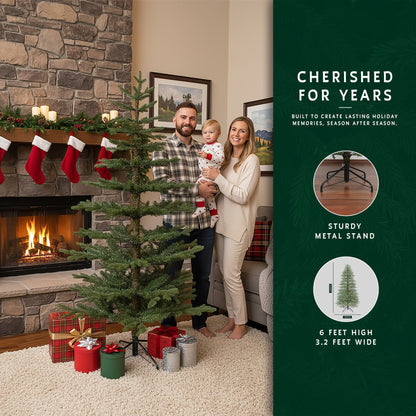 A family smiling next to their 6-foot unlit skinny Christmas tree in a festively decorated living room.