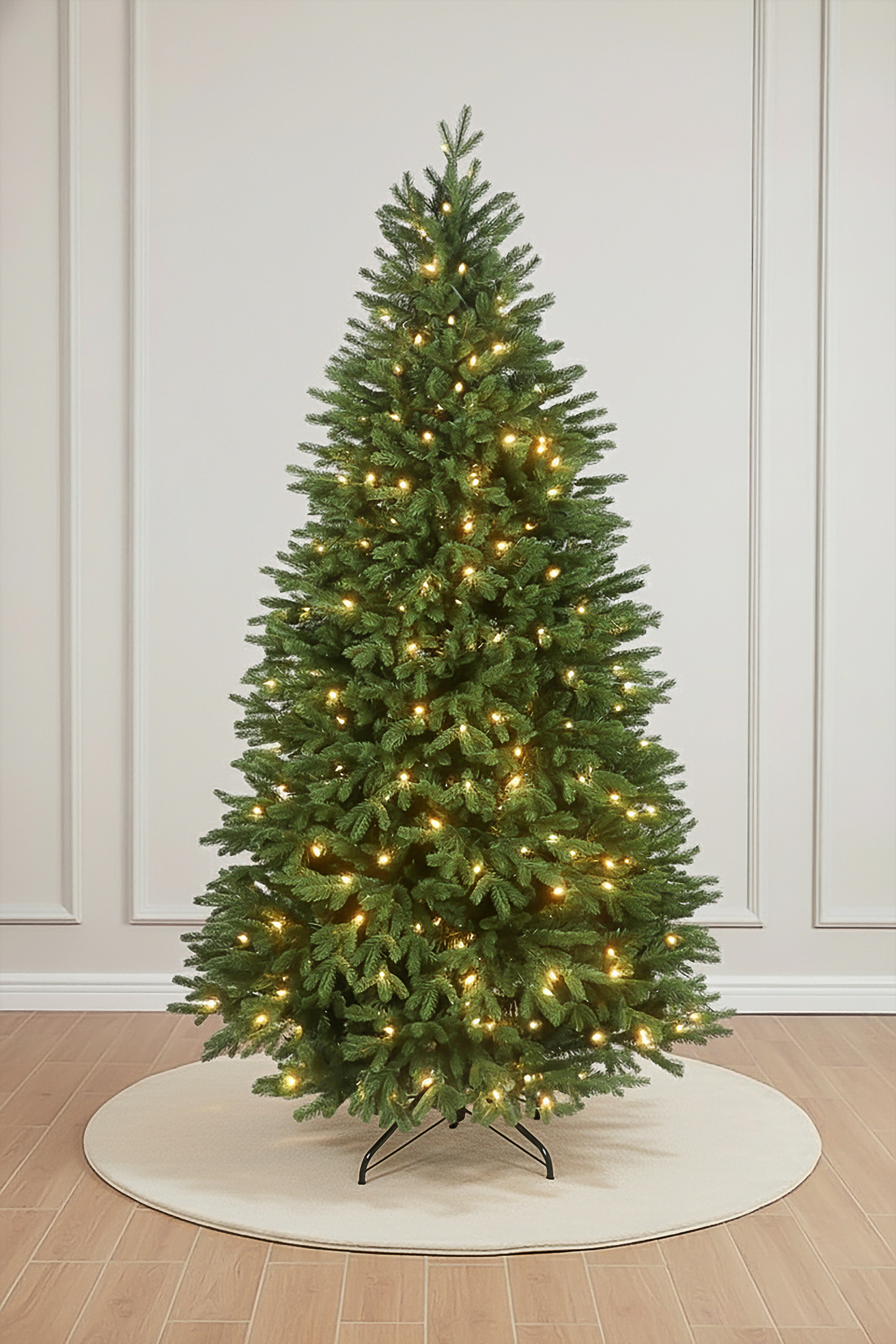 Main product image of the Prelit Heartland Grand Slim Artificial Christmas Tree on a white background.