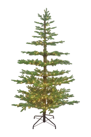 A pre-lit skinny Christmas tree with warm white lights and a sparse, layered noble fir style.