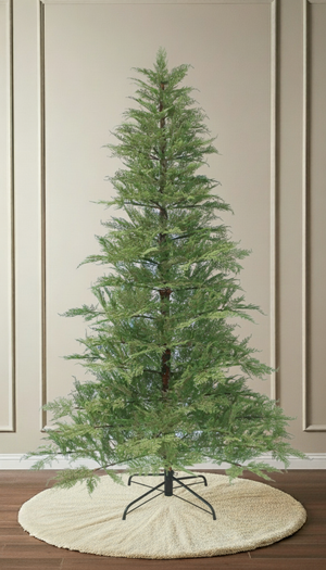 A full-length studio shot of the unlit artificial Cypress Christmas tree, featuring its slender, feathery profile.